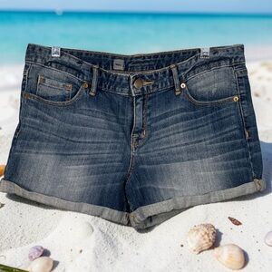 Mossimo Supply Co. blue denim cuffed shorts.
